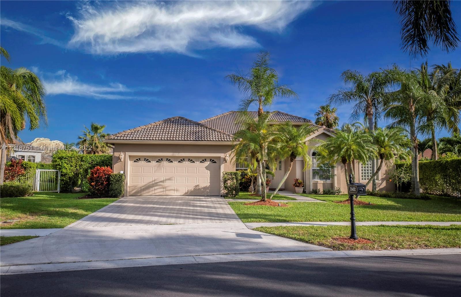21432 Gosier Way Boca Raton, FL 33428 - Photo 6 of 55 a front view of a house with garden