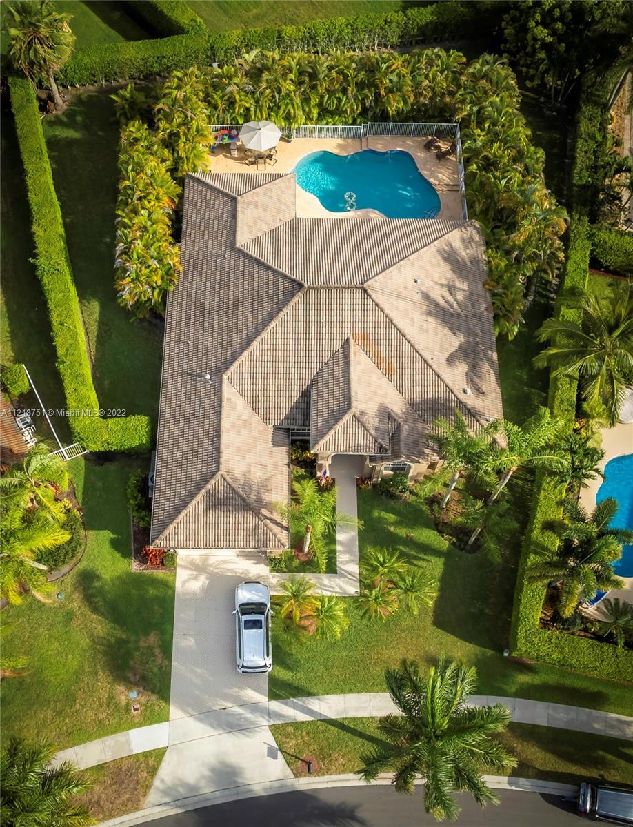 21432 Gosier Way Boca Raton, FL 33428 - Photo 7 of 55 an aerial view of a house with a yard swimming pool and outdoor seating