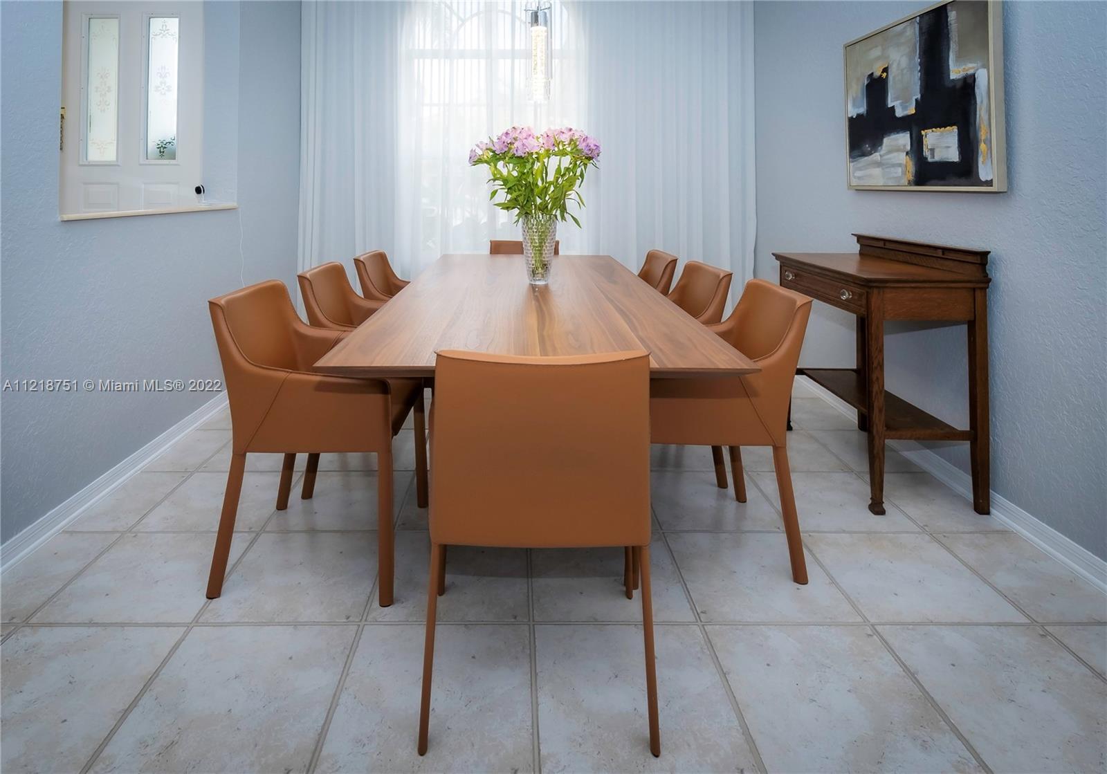 21432 Gosier Way Boca Raton, FL 33428 - Photo 10 of 55 a dining room with furniture and wooden floor