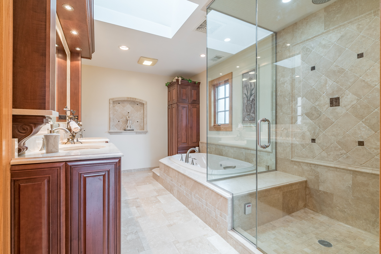 117 Elmore Street Park Ridge, IL 60068 - Photo 15 of 31 a en suite bathroom with a double vanity sink mirror and shower