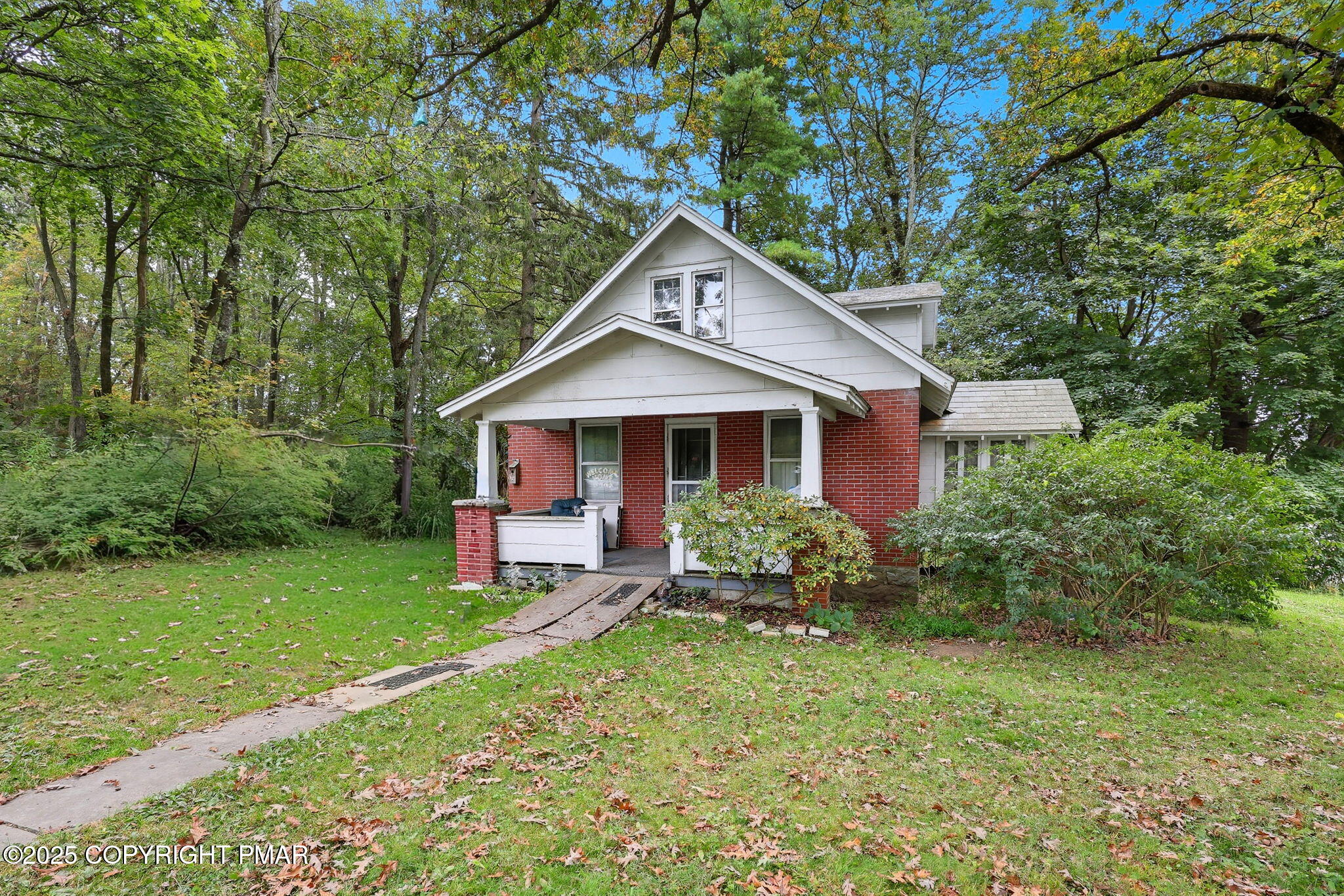 722 Rte 115 Saylorsburg, PA 18353 - Photo 15 of 16 a front view of a house with garden