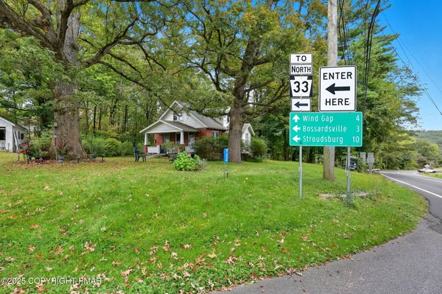 a house view with a garden space