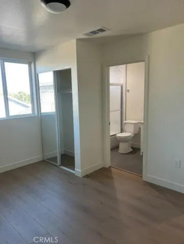 a view of a room that has a window