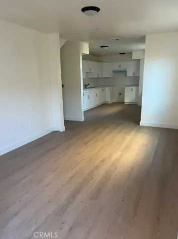 an empty room with a bathroom