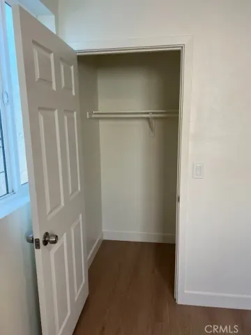 a bathroom with a toilet sink and shower