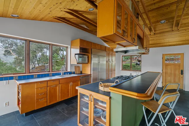 a view of an empty room with a large window