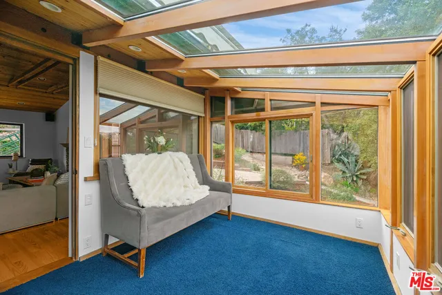 a bedroom with a bed and a walk in closet