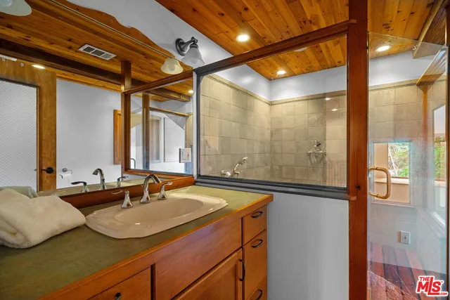 a bedroom with furniture and window