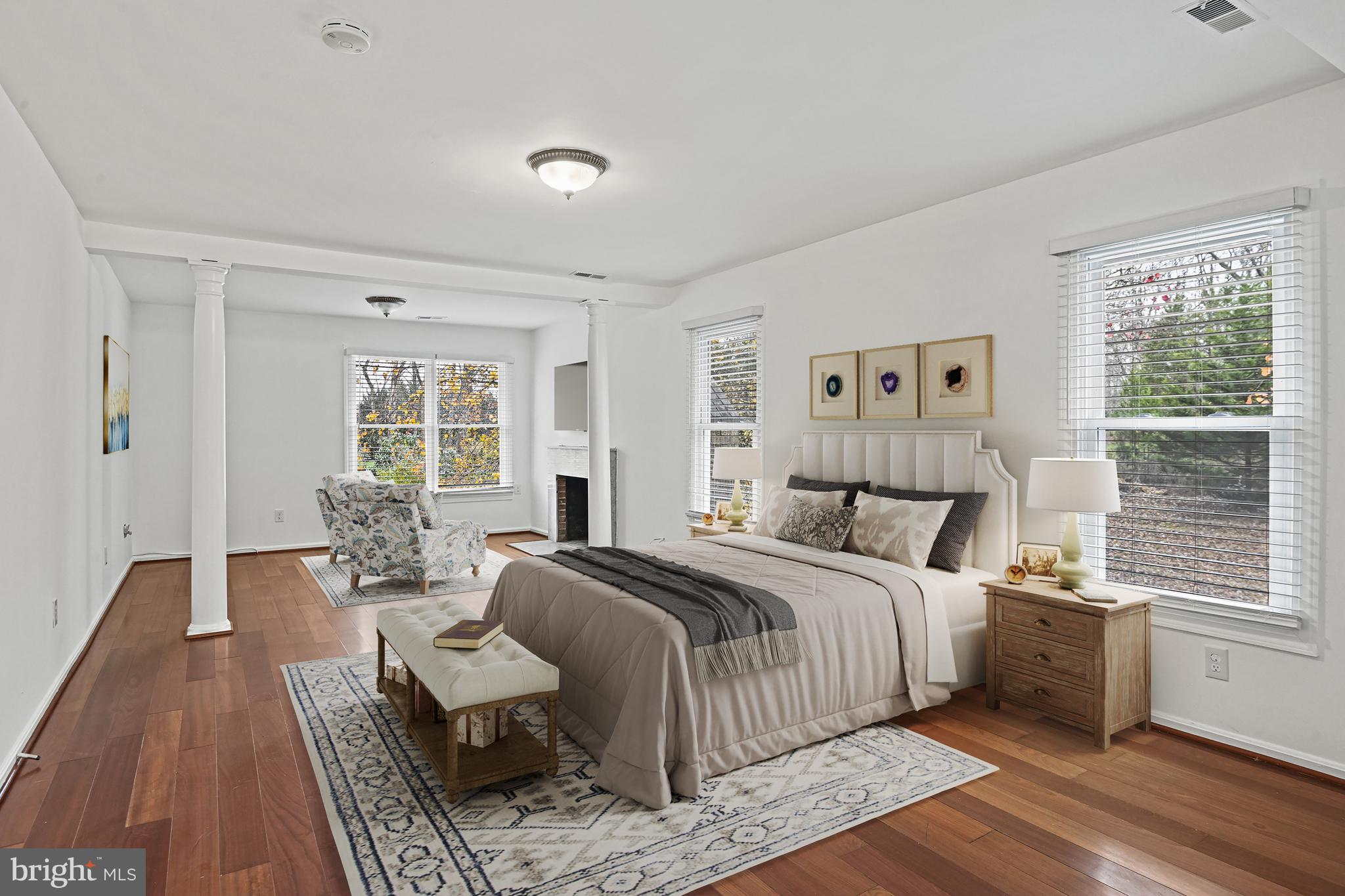 355 Springvale Road Great Falls, VA 22066 - Photo 19 of 44 a bedroom with a large bed and a window