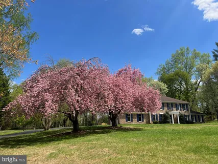 a view of a building with a yard