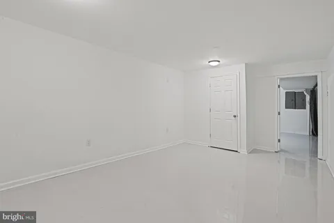 a view of a big yard with trees