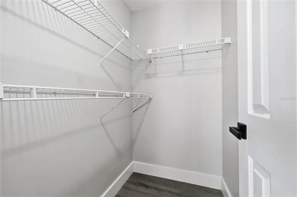 a view of small space with racks on the wall