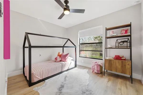a bedroom with furniture and a bed