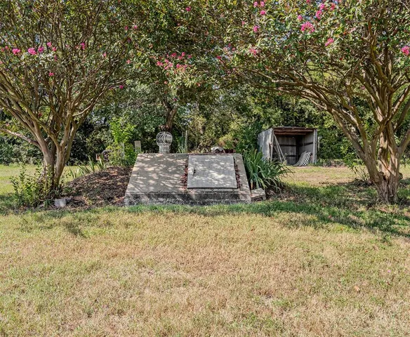 a view of a lake with trees