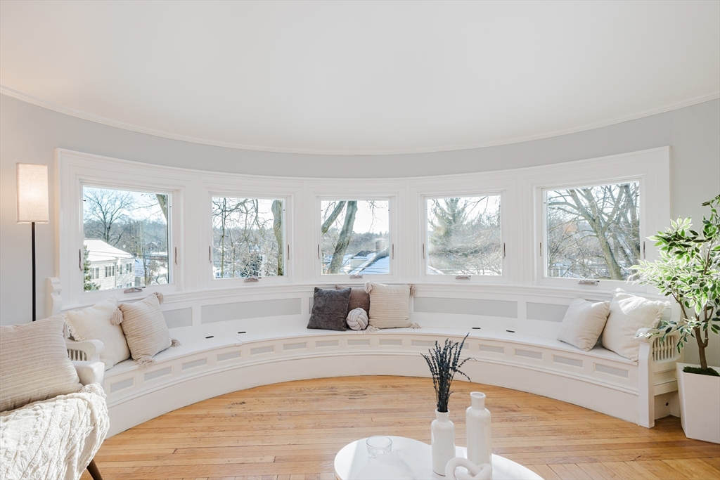 159 Washington Street, Unit 4 Newton, MA 02458 - Photo 11 of 41 a living room with furniture and a large window