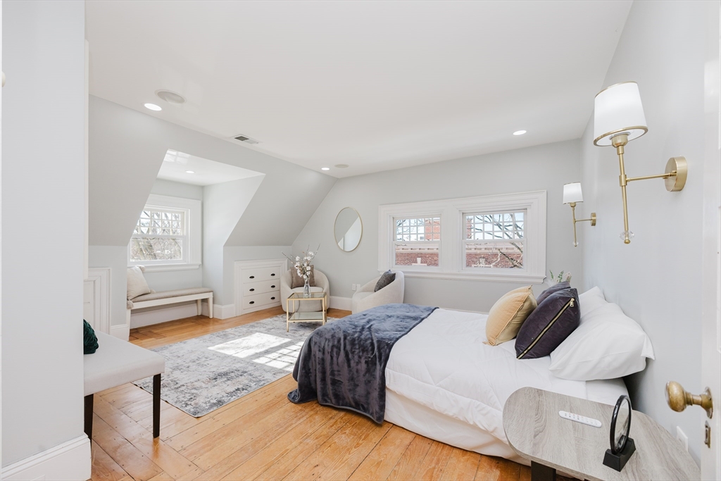 159 Washington Street, Unit 4 Newton, MA 02458 - Photo 13 of 41 a bedroom with a bed and window