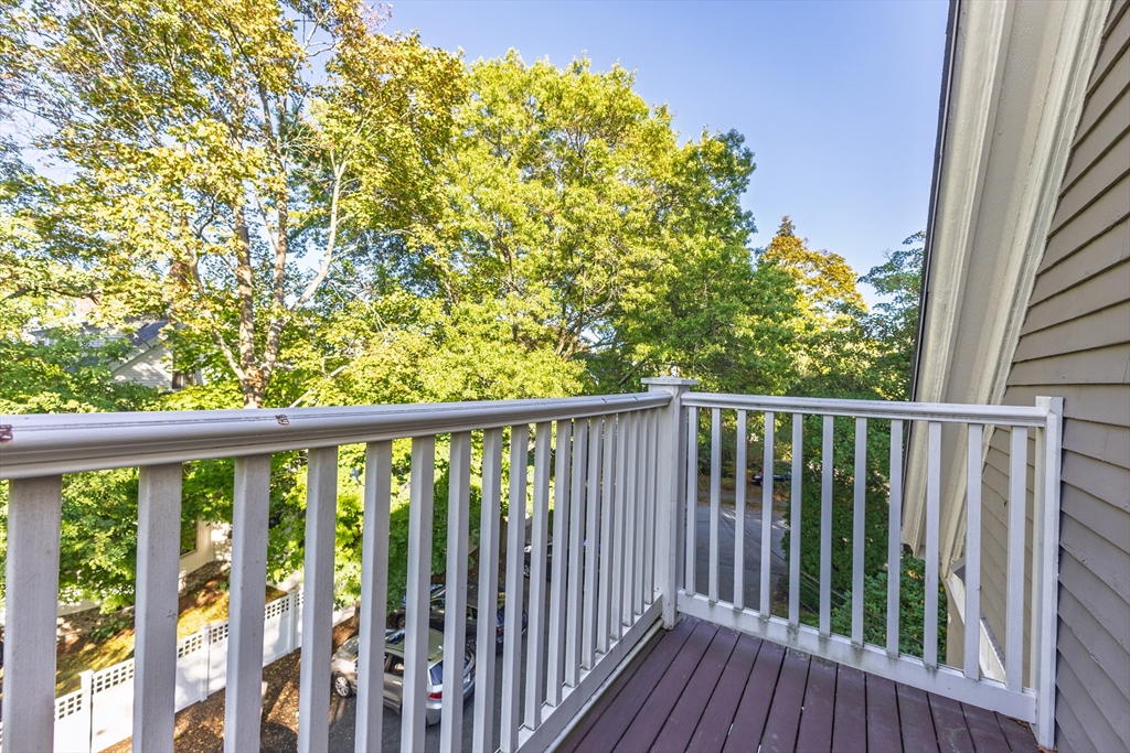 159 Washington Street, Unit 4 Newton, MA 02458 - Photo 33 of 41 a view of a balcony with wooden floor