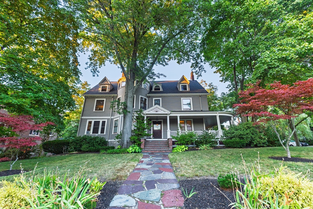 159 Washington Street, Unit 4 Newton, MA 02458 - Photo 35 of 41 a front view of a house with a yard