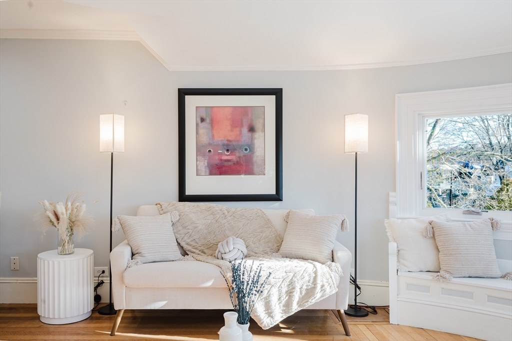 159 Washington Street, Unit 4 Newton, MA 02458 - Photo 39 of 42 a living room with furniture and a large window