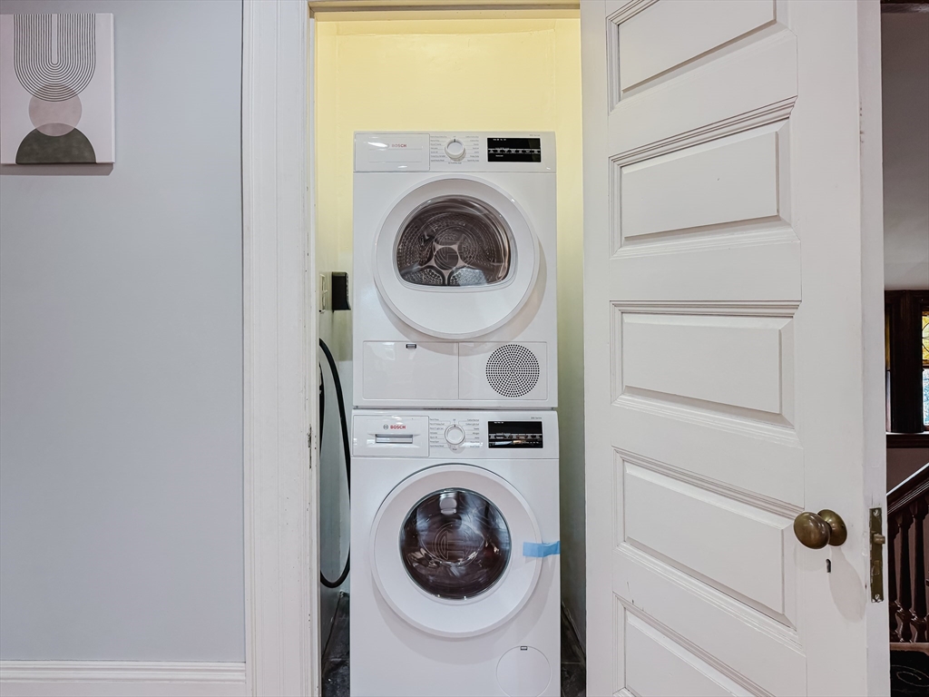 159 Washington Street, Unit 4 Newton, MA 02458 - Photo 42 of 42 a utility room with dryer and washer