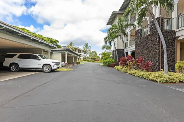 a view of a car parked in front of a house
