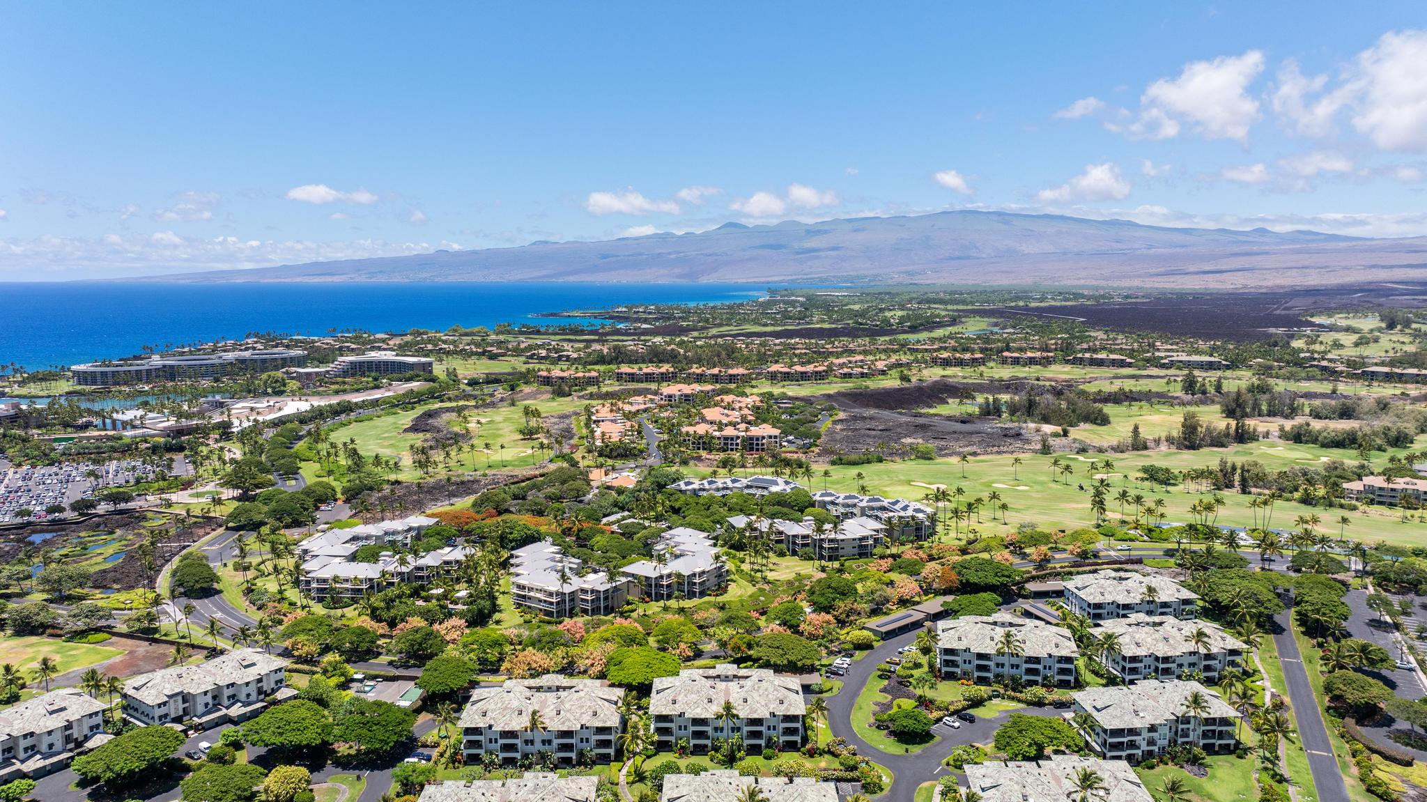 69-1000 Kolea Kai Circle, Unit 11C Waikoloa, HI 96738 - Photo 16 of 30 an aerial view of residential building and trees around