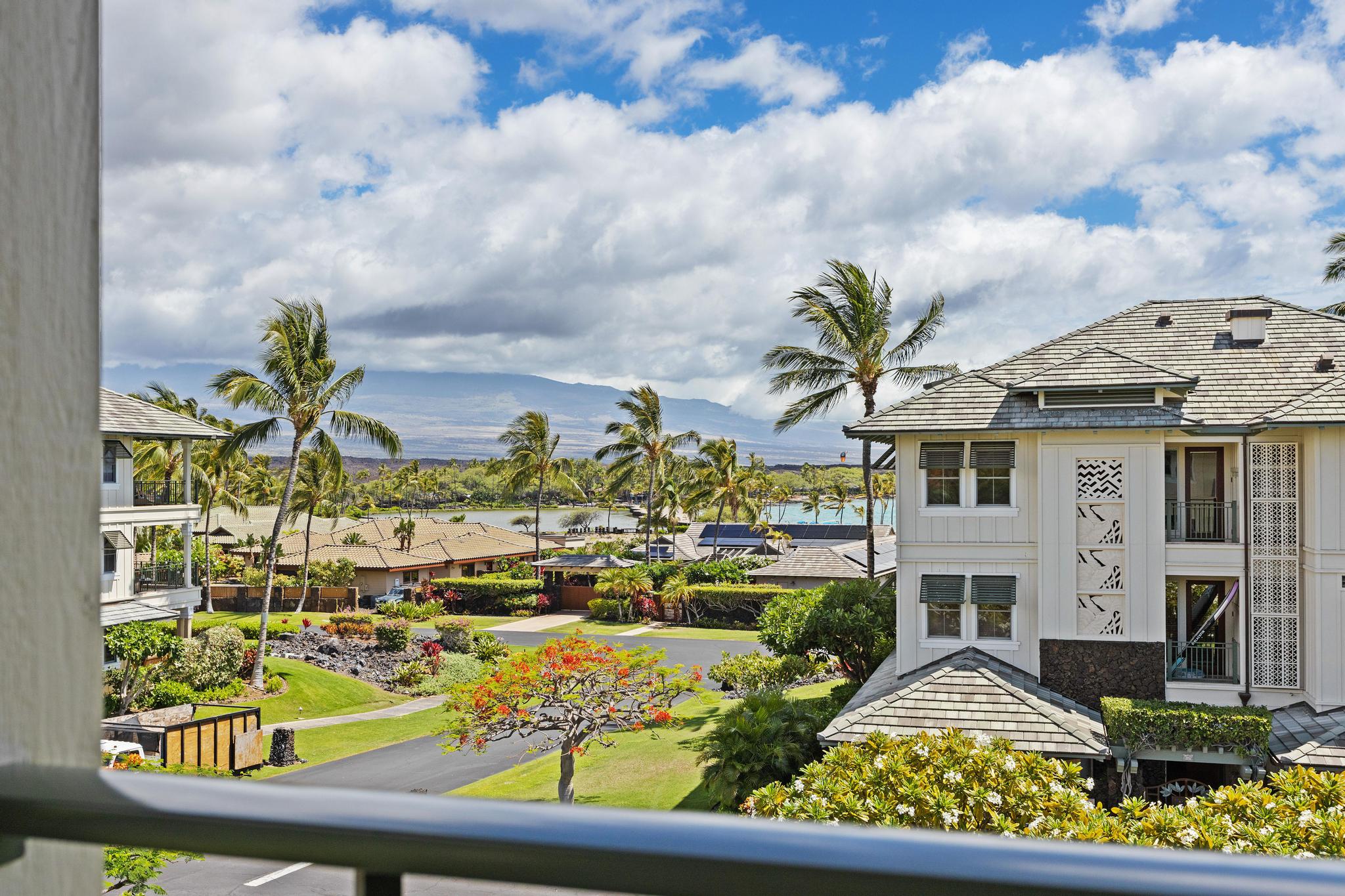 69-1000 Kolea Kai Circle, Unit 11C Waikoloa, HI 96738 - Photo 2 of 30 a view of a swimming pool with outdoor seating