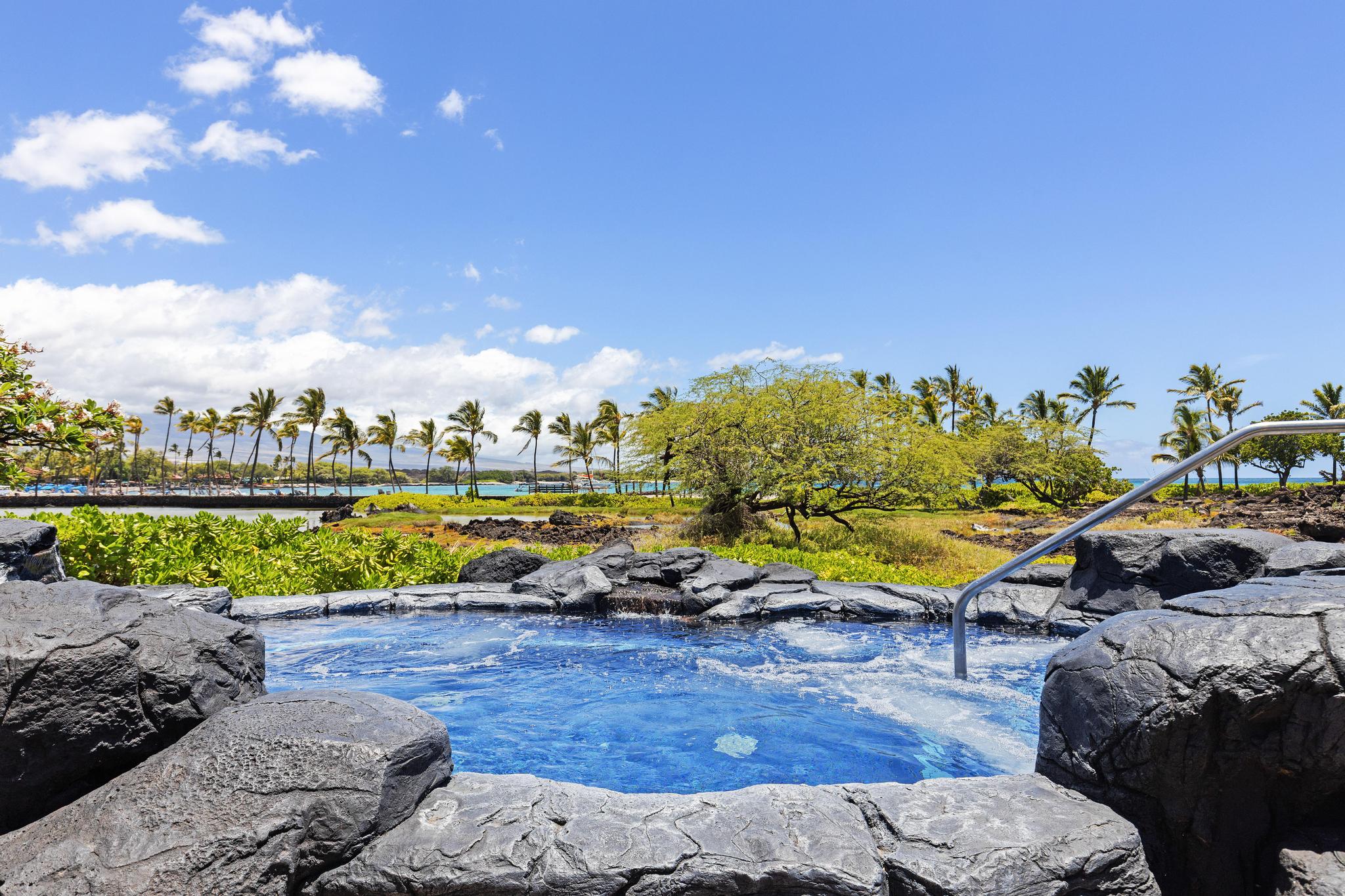 69-1000 Kolea Kai Circle, Unit 11C Waikoloa, HI 96738 - Photo 24 of 30 a view of swimming pool outdoor seating and city view