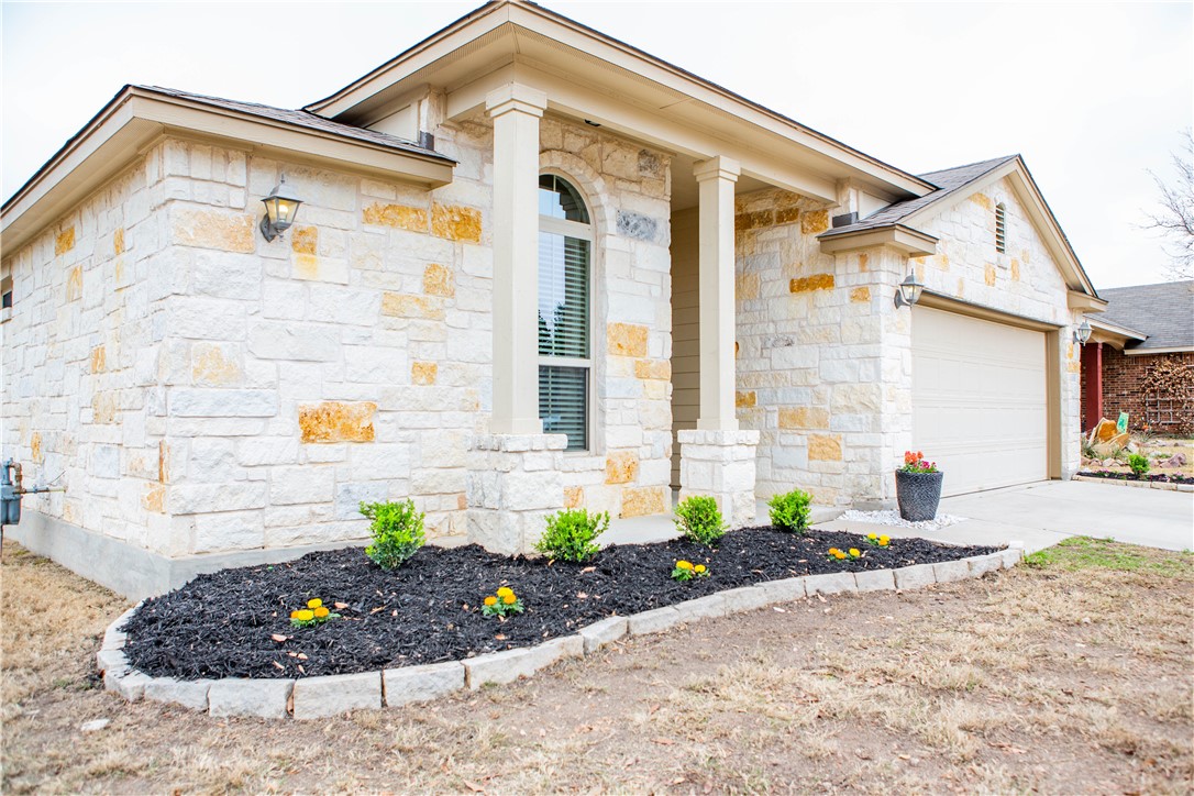 1000 Drake Cove Leander, TX 78641 - Photo 1 of 1 a front view of a house with a yard