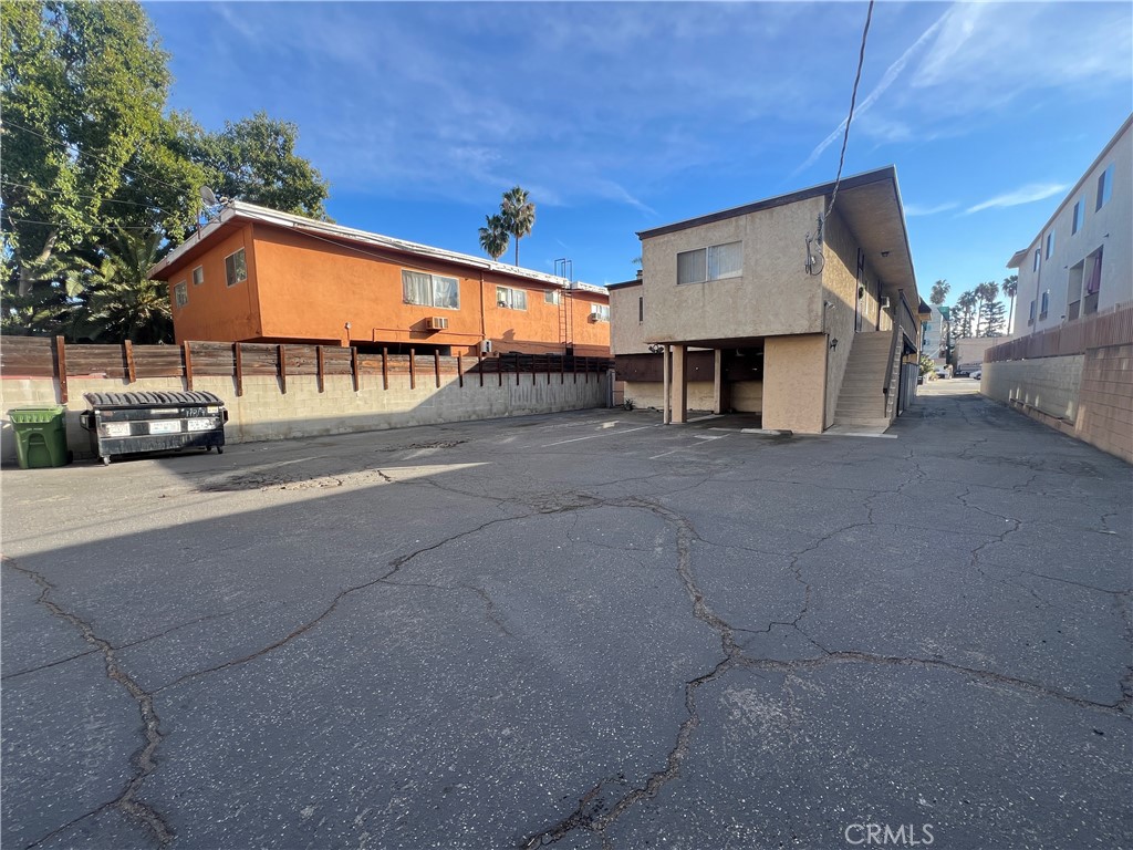 14817 Sylvan Street, Unit 3 Van Nuys, CA 91411 - Photo 12 of 12 a view of a car park in front of house