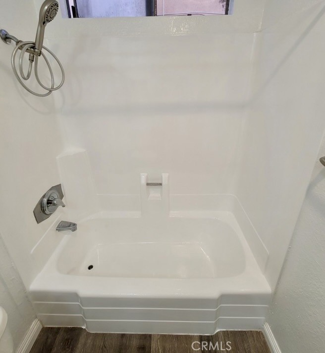 14817 Sylvan Street, Unit 3 Van Nuys, CA 91411 - Photo 10 of 12 a bathroom with a bathtub