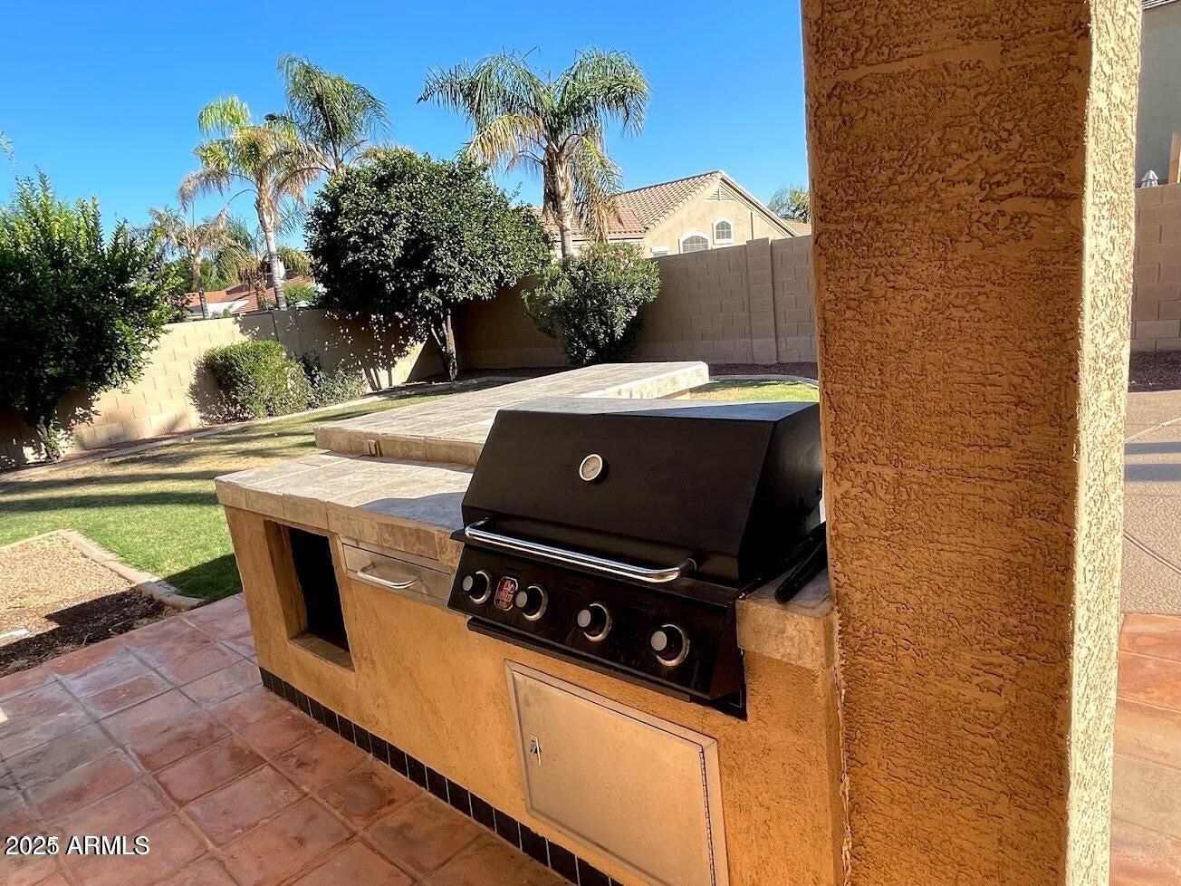 3235 East Devonshire Court Gilbert, AZ 85297 - Photo 27 of 28 a view of a fireplace with sitting area