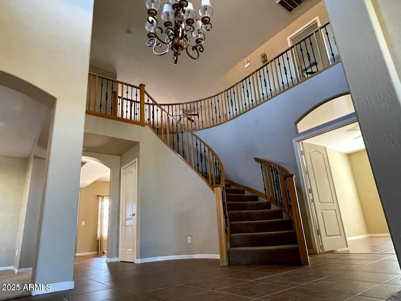3235 East Devonshire Court Gilbert, AZ 85297 - Photo 6 of 28 a view of entryway and hall with wooden floor