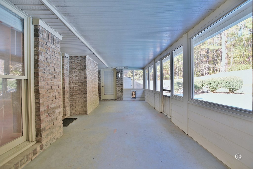 8935 K Moore Road Columbus, GA 31904 - Photo 29 of 36 en empty room with windows