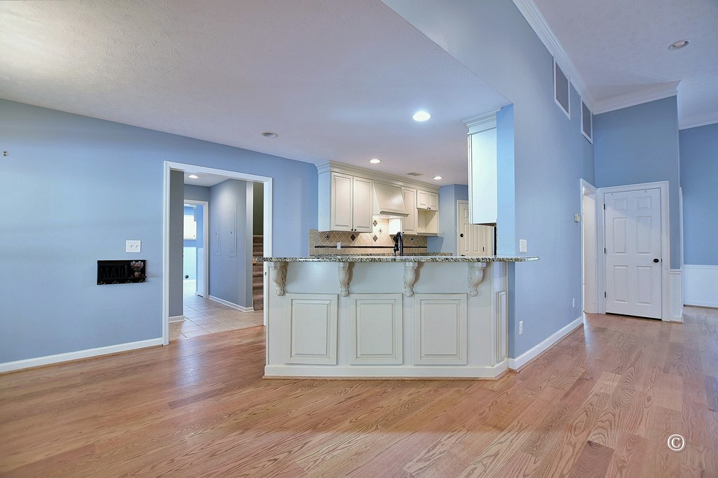 8935 K Moore Road Columbus, GA 31904 - Photo 8 of 36 a kitchen with stainless steel appliances granite countertop a refrigerator a sink a stove and oven