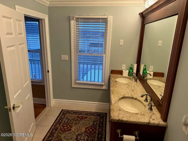 a room with window and furniture