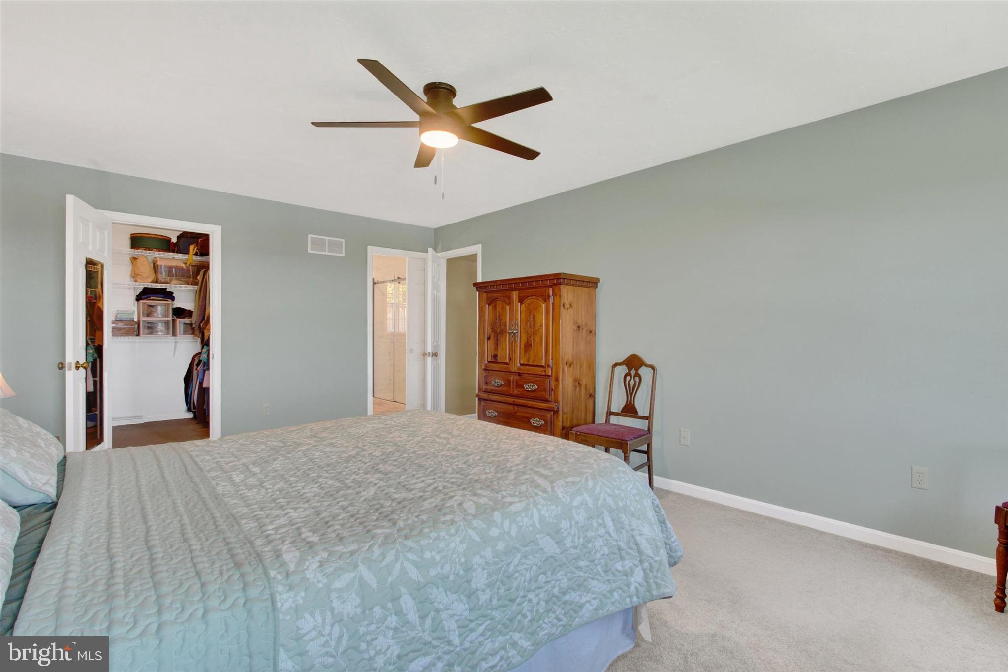 2474 Meeting House Road Spring Grove, PA 17362 - Photo 22 of 51 a bedroom with a bed and a dresser