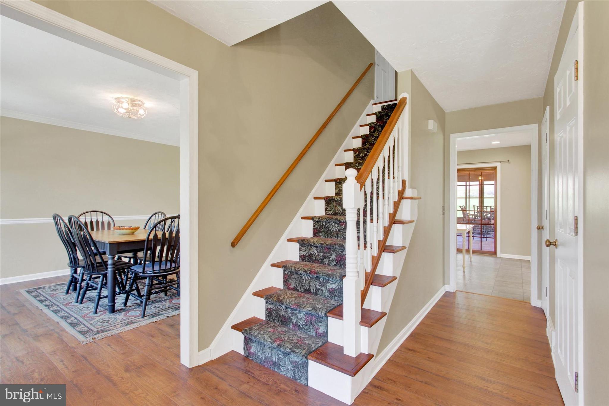 2474 Meeting House Road Spring Grove, PA 17362 - Photo 6 of 51 a view of entryway dining room and hall with wooden floor