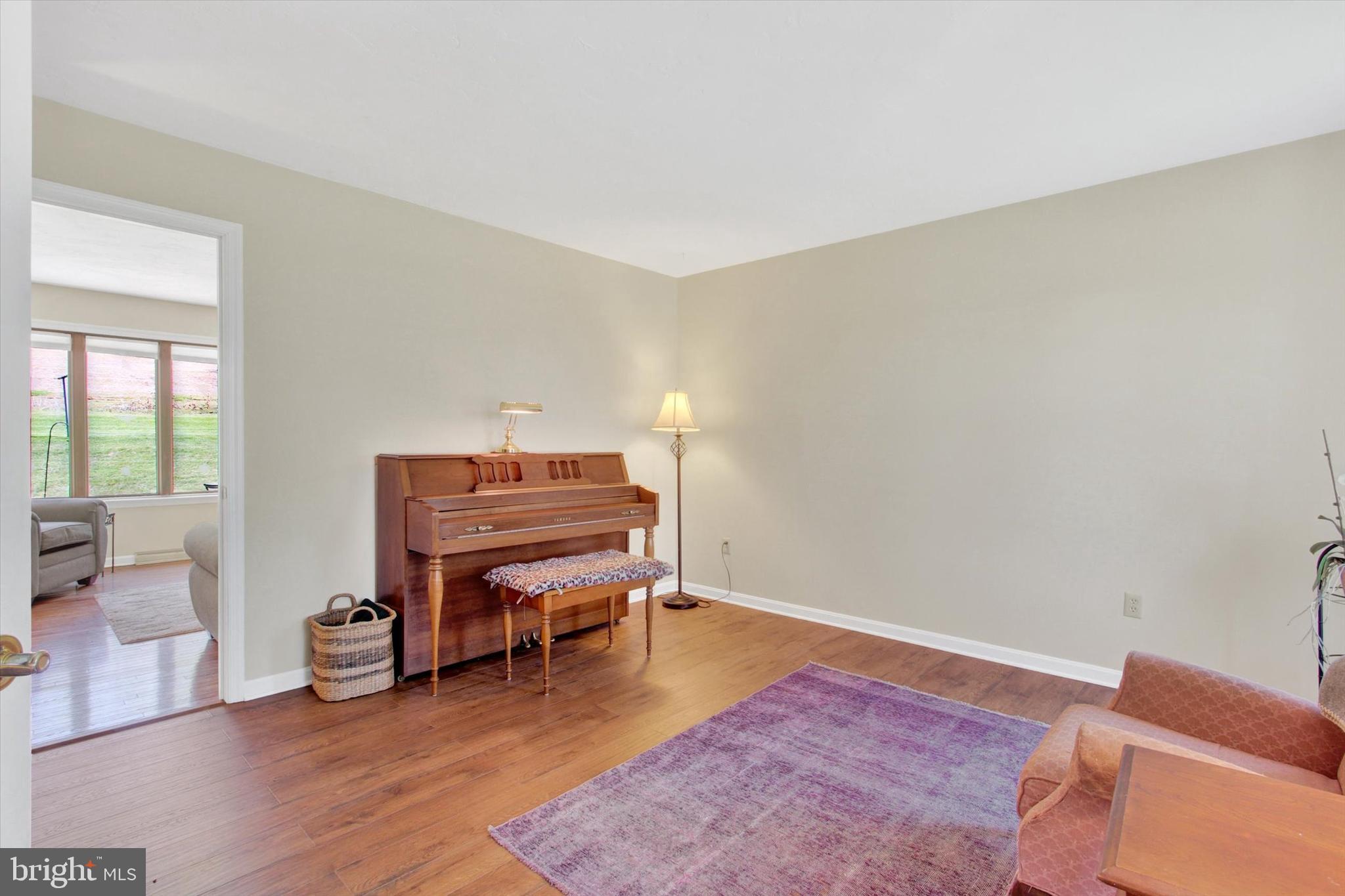 2474 Meeting House Road Spring Grove, PA 17362 - Photo 7 of 51 a room with furniture and a wooden floor