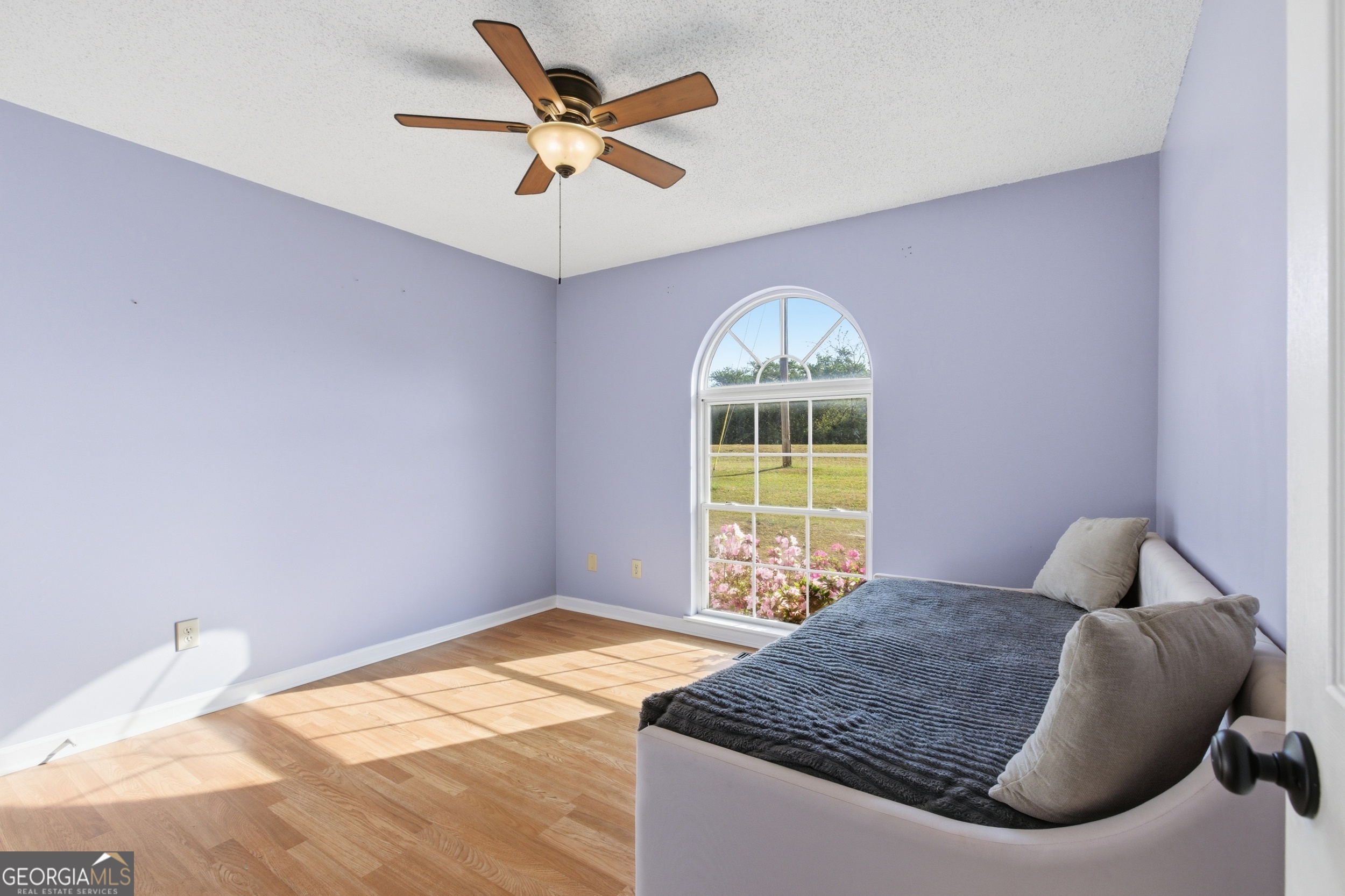 260 Brookhaven Circle Toccoa, GA 30577 - Photo 17 of 26 a bedroom with a bed and a large window