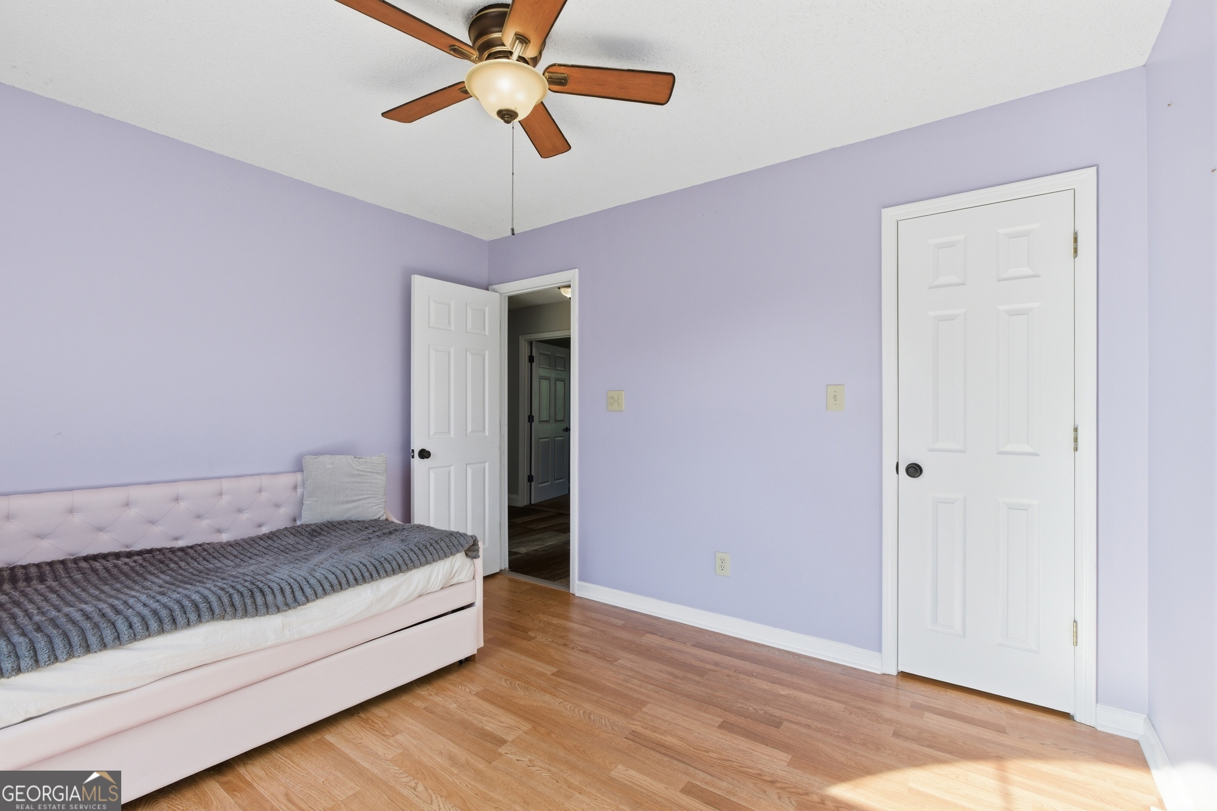 260 Brookhaven Circle Toccoa, GA 30577 - Photo 18 of 26 a bedroom with a bed and a ceiling fan