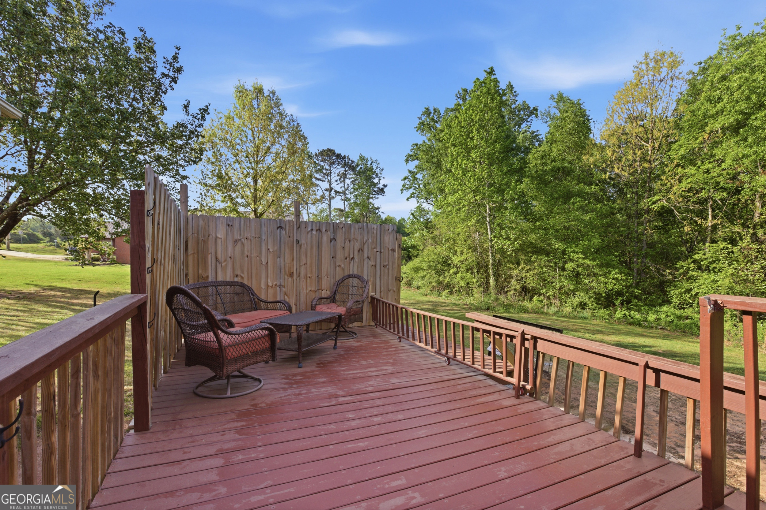 260 Brookhaven Circle Toccoa, GA 30577 - Photo 22 of 26 a view of a wooden deck with furniture