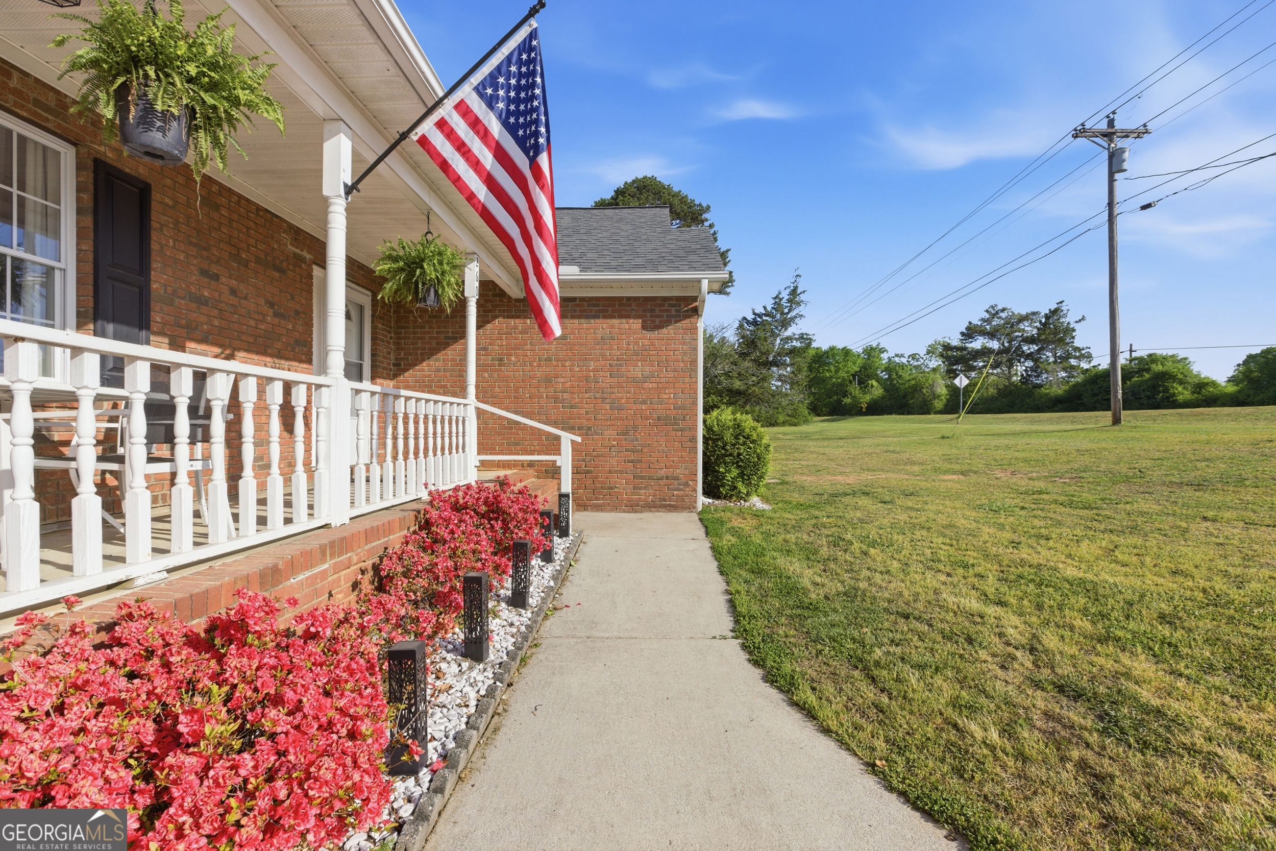260 Brookhaven Circle Toccoa, GA 30577 - Photo 24 of 26 a view of a pathway of a house with a yard