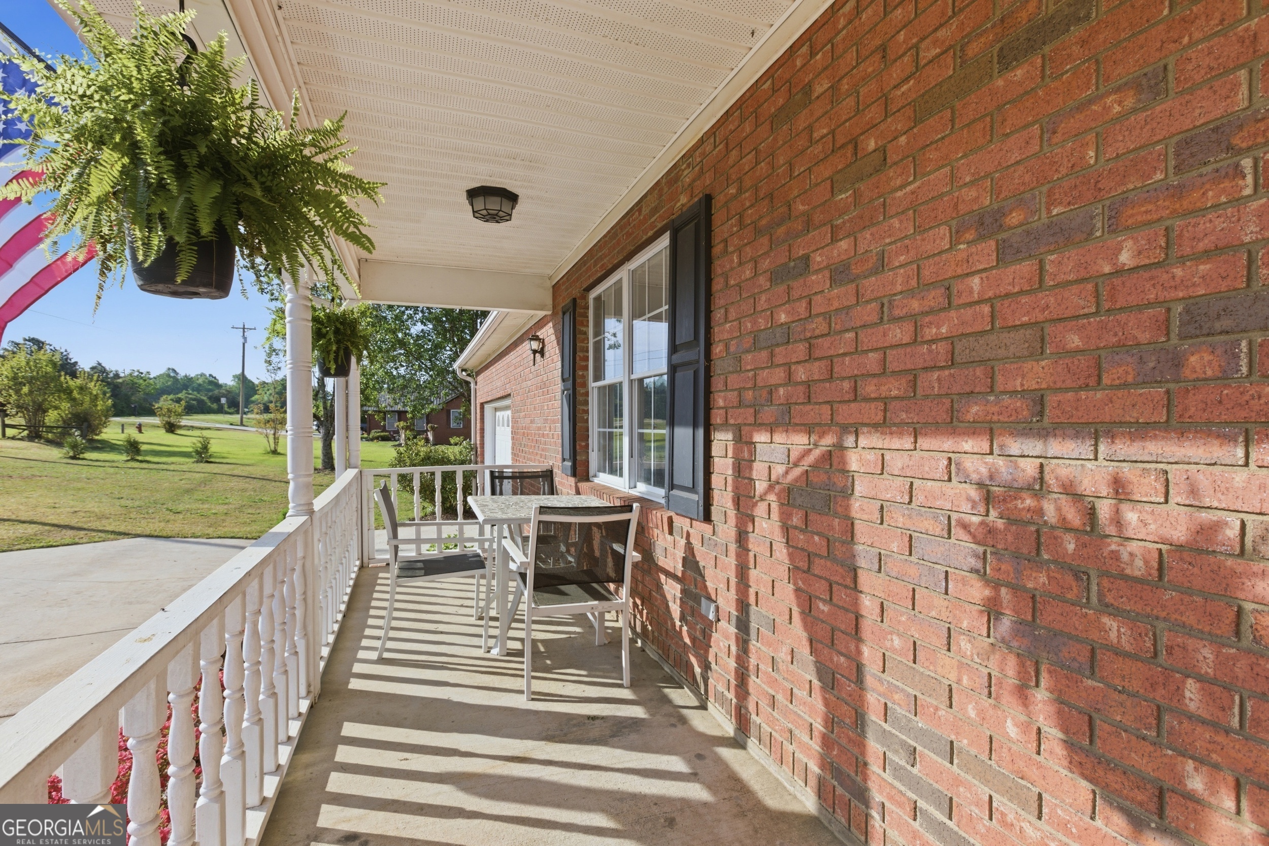 260 Brookhaven Circle Toccoa, GA 30577 - Photo 25 of 26 a view of a house with backyard porch and sitting area