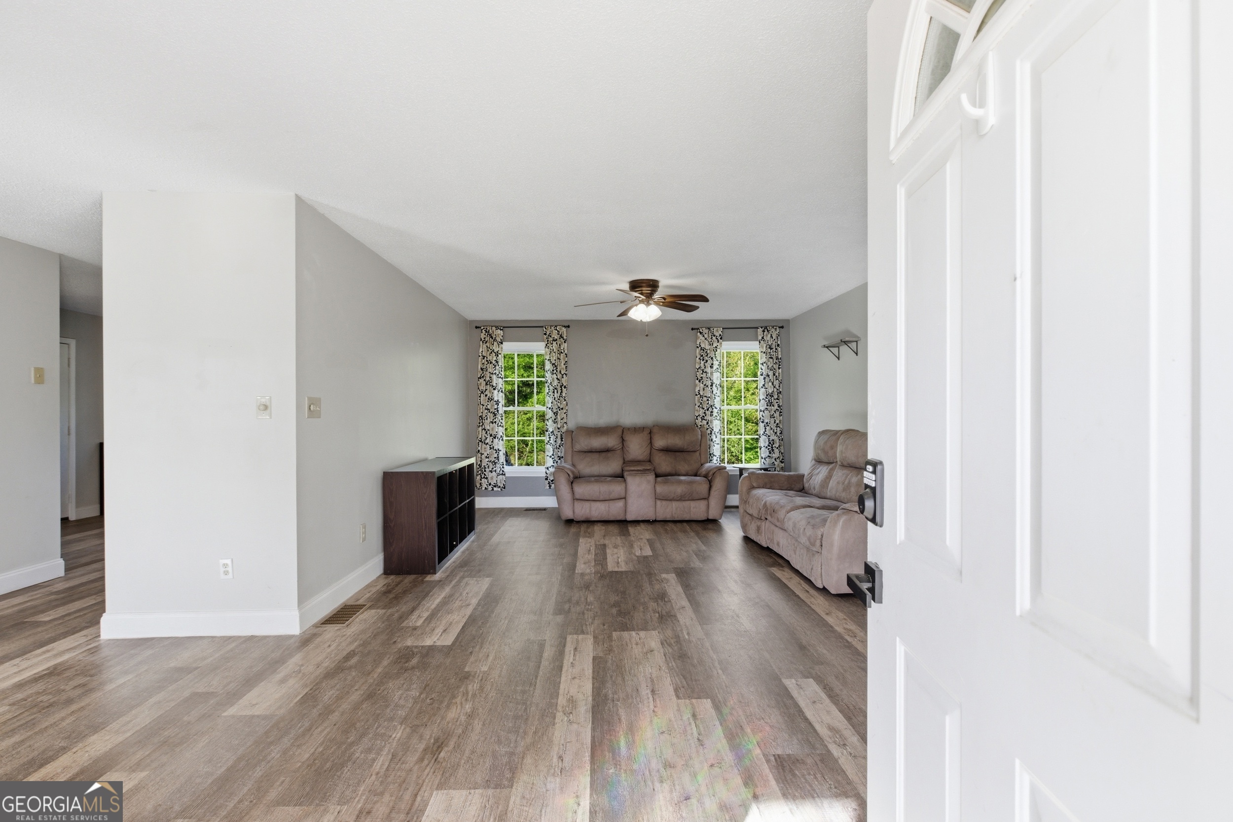 260 Brookhaven Circle Toccoa, GA 30577 - Photo 3 of 26 a living room with furniture and a fireplace