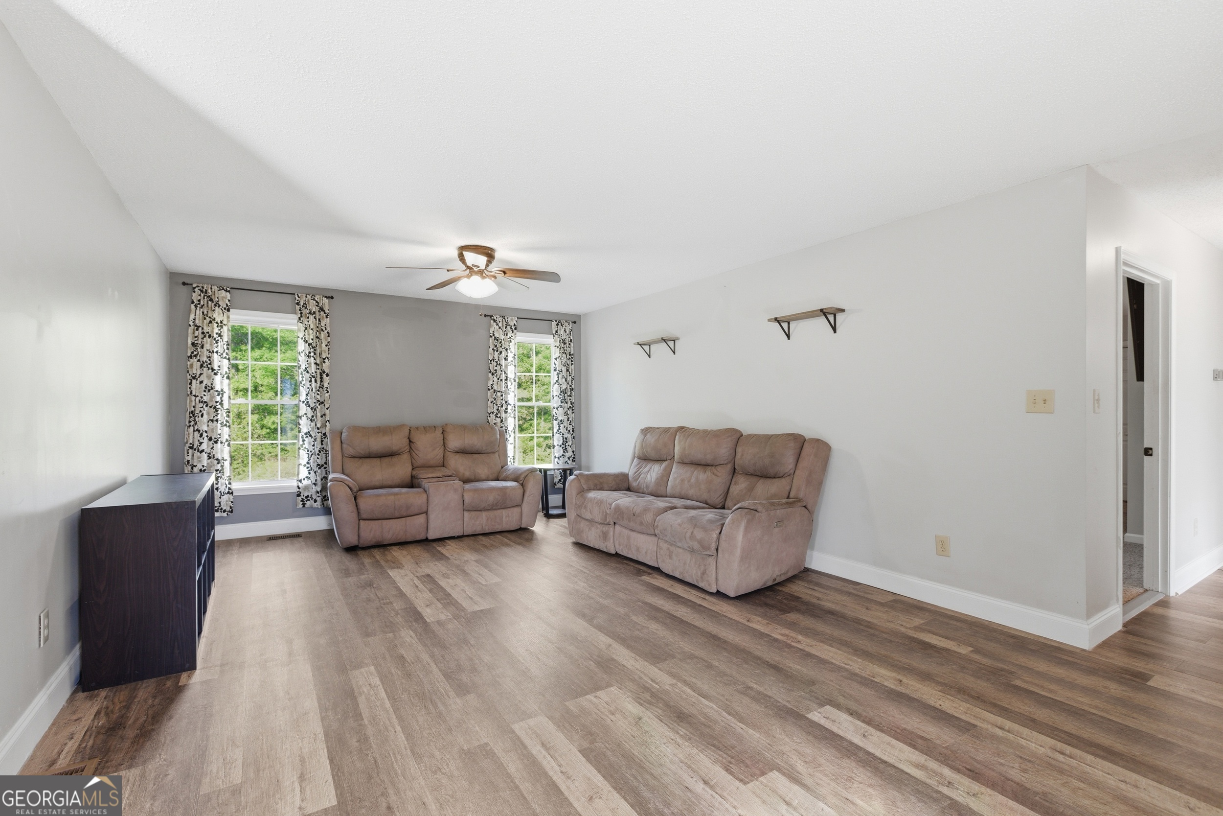 260 Brookhaven Circle Toccoa, GA 30577 - Photo 4 of 26 a living room with furniture and a large window