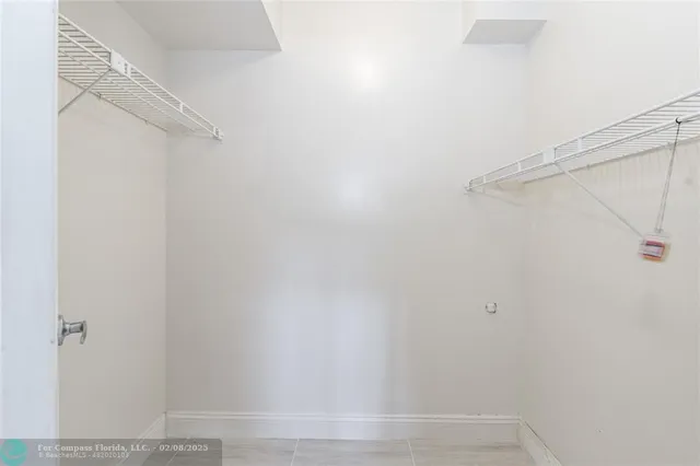 a view of small space with racks on the wall