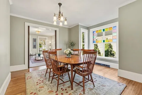 a kitchen with stainless steel appliances a refrigerator sink and microwave