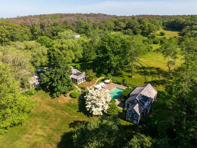 a backyard of a house with lots of green space