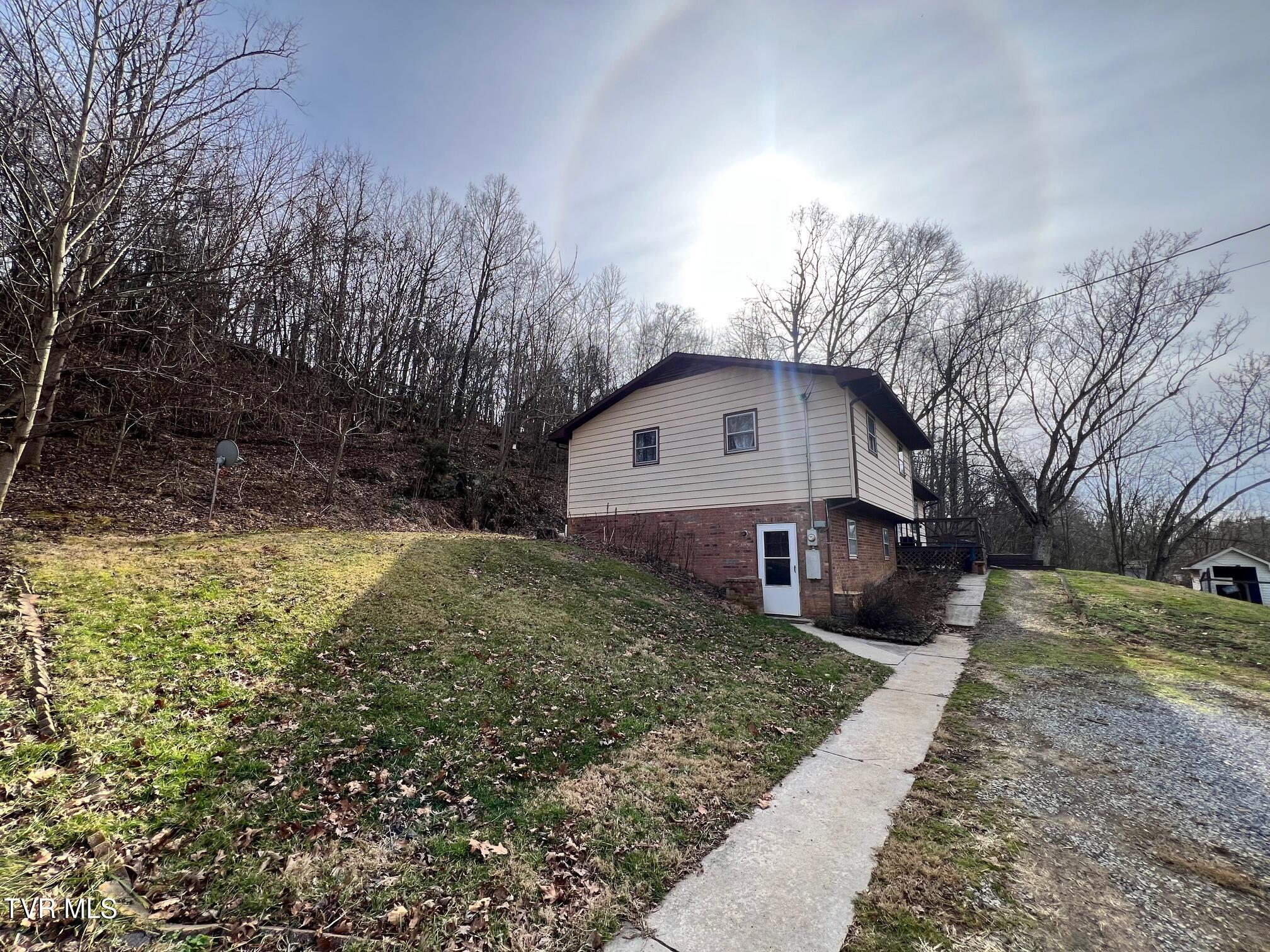 345 Mt Wesley Road Telford, TN 37690 - Photo 28 of 39 Sidewalk to Basement Enrty
